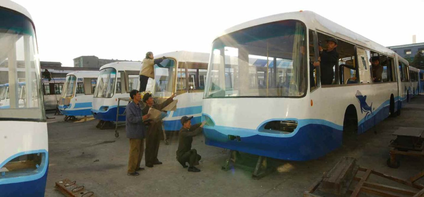 Pyongyang — Electric Transport Personnel; Pyongyang — Trolleybus Factory